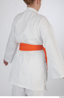 Selin dressed jiu-jitsu kimono orange belt sports upper body 0006.jpg